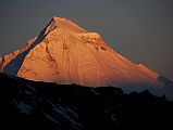 21 Dhaulagiri South And North Faces Close Up At Sunrise From Camp Below Mesokanto La The South and North Faces of  Dhaulagiri blazed at sunrise from the camp just below the Mesokanto La. We descended in one 4-hour push from below the Mesokanto La at 4800m to Jomsom at 2760m. The 2040m descent was brutal on the knees.
